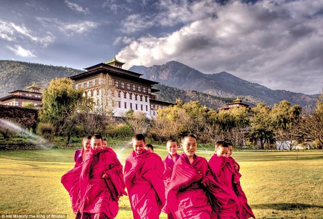 Young Buddhist monks gather in front of the King's Palace in the capital city, Thimpu, in this photo, taken by His Majesty the King of Bhutan
