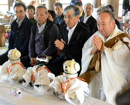 The funeral service paid tribute to 71 broken Aibo robots who will be dismantled to provide parts for other robots. (Hirokazu Inada) 
