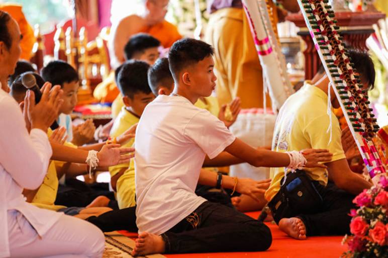 Some of the rescued Thai soccer players at a Buddhist temple in Chiang Rai.