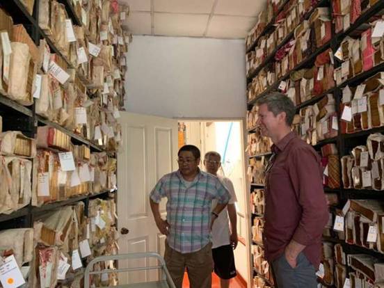 Description: BDRC executive director Jann Ronis at Peter Skillings Fragile Palm Leaves Foundation library in Bangkok, in 2019. From khyentsefoundation.org
