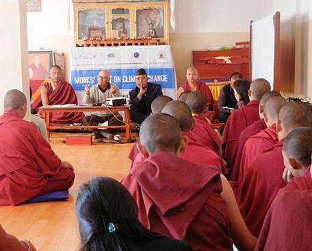 Description: Monks at a prayer session against climate change. 
 / Credit:Sudeshna Sarkar/IPS