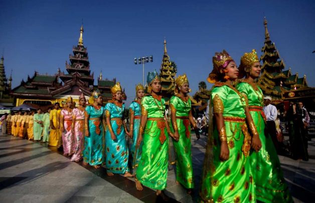 Description: Myanmar's women in ancient dresses take part in the 2,600th anniversary celebrations of Shwedagon Pagoda in Yangon, Myanmar, Wednesday, Feb. 22, 2012. Gongs chimed as thousands of people in
 ceremonial costumes walked barefoot Wednesday through the marble walkways of
 Myanmar's most sacred Buddhist shrine in an annual festival that was banned for more than 20 years under the former military government. Photo: Altaf Qadri / AP