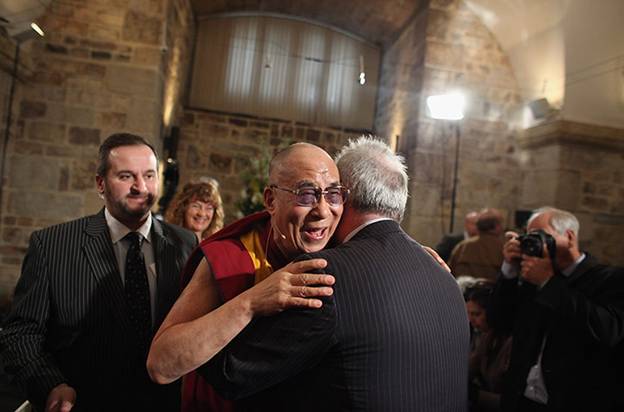 Description: Dalai Lama visits UK: The Dalai Lama is welcomed by Richard Moore