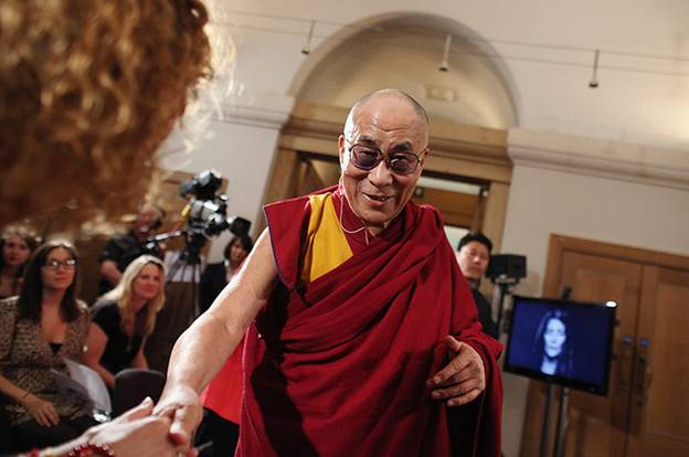 Description: Dalai Lama visits UK: The Dalai Lama greets the press on his visit to the UK