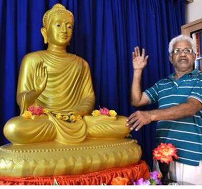 P. Narendranath explains facts about the Buddha Statue donated to Victoria Museum in Vijayawada.- PHOTO: V. RAJU