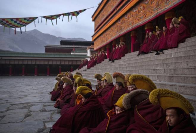 Monks gather at Labrang monastery in Gansu province, China, one of the six great monasteries of the Gelug, or Yellow Hat, school of Tibetan Buddhism and one of the largest outside of Tibet.