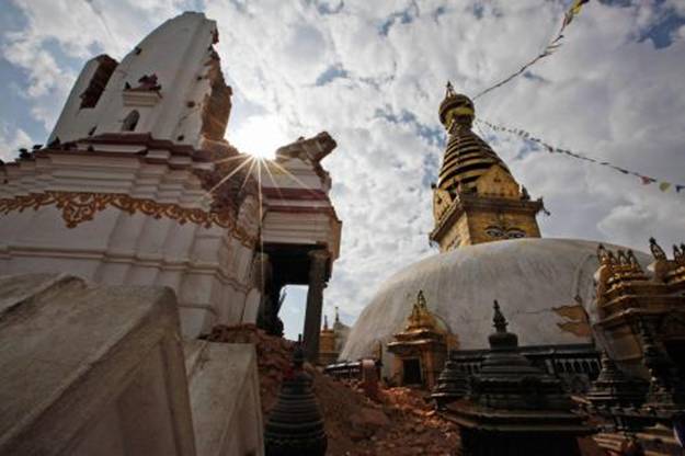 One of Nepal’s oldest and most venerated shrines, the Swayambunath temple complex suffered damage in the April 25th and May 12th earthquakes. Conservators hope to shore up the main stupa before monsoon rains arrive.  PHOTOGRAPH BY NIRANJAN SHRESTHA, AP