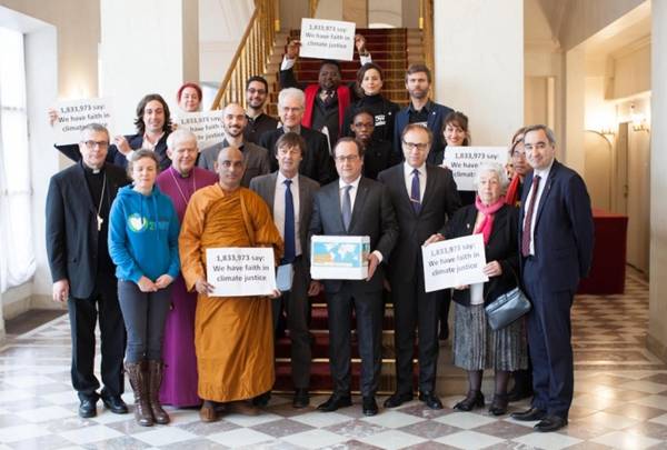 President Hollande with faith leaders. From Sean Hawkey, World Council of Churches