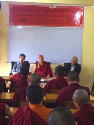 Geshe Lhakdor (centre) speaking on the inaugural of the 3rd Modern Science Workshop for Tibetan Buddhist Monks & Nuns at the Tibetan Reception Centre, Dharamshala accompanied by Karma Yeshi (left) and Thupten Tsering, joint secretary of DRC (right), August 1, 2016. 