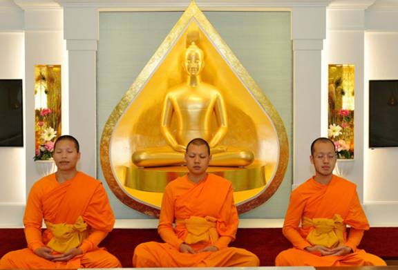 (left to right) Para Ar Garn Anocha, Para Ar Garn Parnchanok and Para Ar Garn Thada in the Meditation room. Picture by FRANK REID