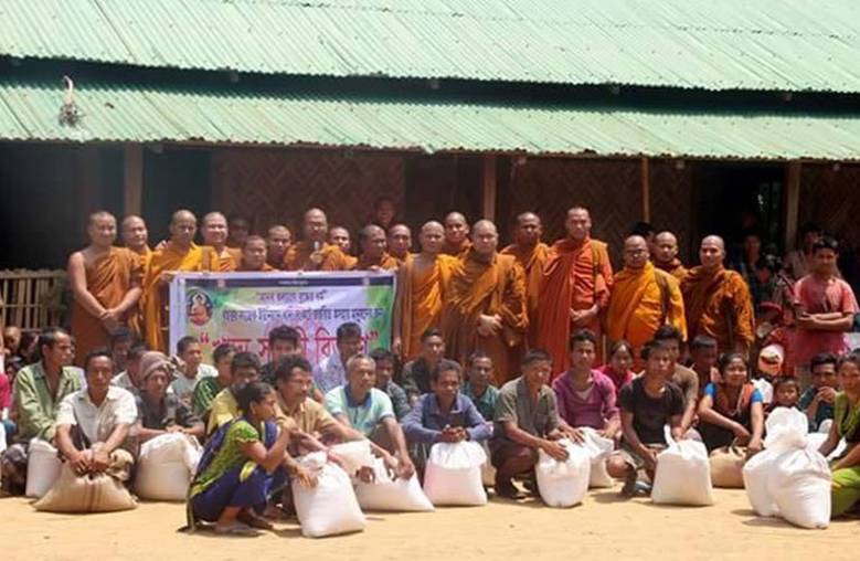 Monks stand by starving Sajek villagers