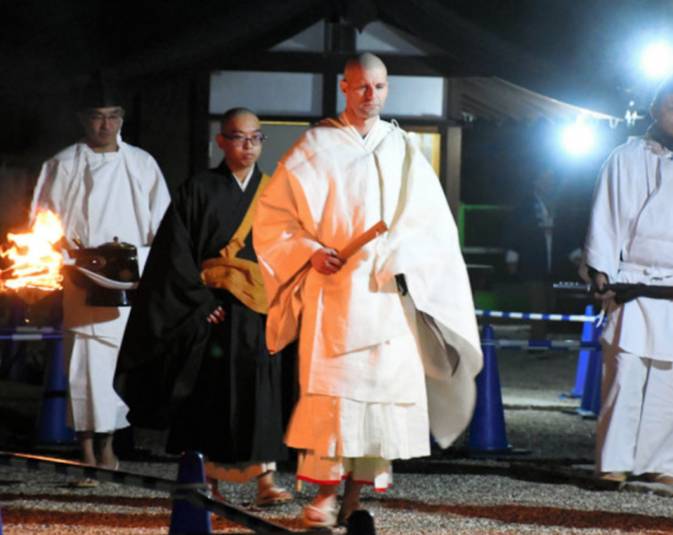 Description: Gyoei Saile walks to his oral exam at Kofuku-ji. From asahi.com