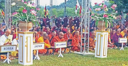 Description: Mass Tripitak recitation begins in Lumbini