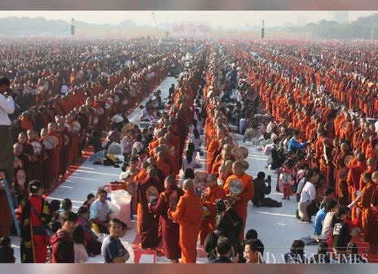 Description: Mandalay regional government held a donation ceremony to 30,000 monks on December 8. Photo: Phyo Wai Kyaw/The Myanmar Times