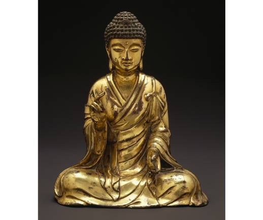 A golden statue of a Buddha